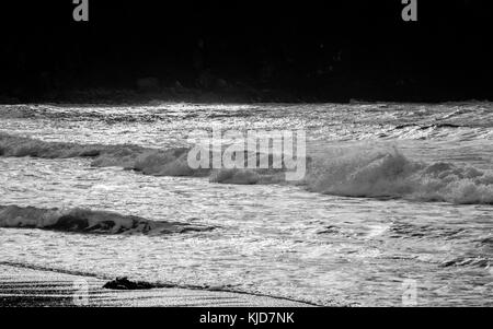 Waves crashing onto Porth Neigwl Beach, near Abersoch, Gwynedd, Wales Stock Photo