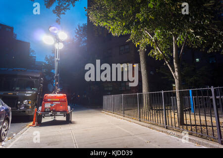 Temporary lighting outside of playground in yhe NYCHA Elliot Houses complex of apartments in Chelsea in New York is seen on Wednesday, November 15, 2017. The chair of the New York City Housing Authority, Shola Olatoye, is reported to have signed off on paperwork certifying that NYCHA had done lead paint inspections where in reality she knew that had not been compliant. (© Richard B. Levine) Stock Photo