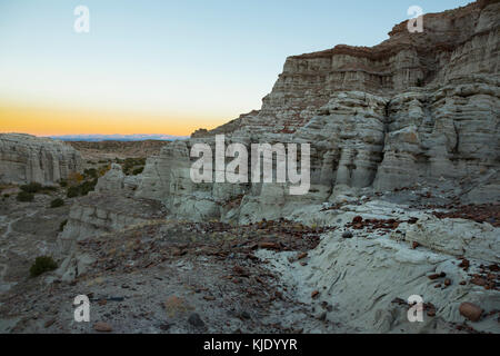 'Sunset on cliffs in desert, Abiquiu, New Mexico, United States' Stock Photo