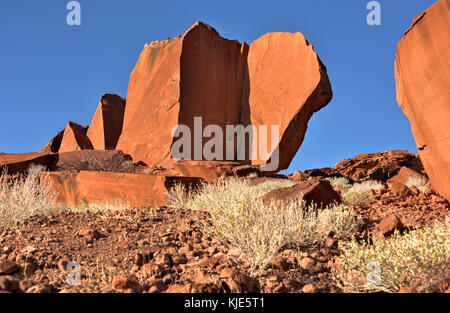 Bushman prehistoric rock engravings at the UNESCO World Heritage Center in Twyfelfontein, Namibia. Stock Photo