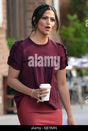 NEW YORK, NY - JUNE14: Camila Alves looks chic in burgundy top and pencil skirt as she leaves New York hotel. Camila Alves is a Brazilian-American model and designer. She is married to American actor Matthew McConaughey on June 14, 2016 in New York City.  People:  Camila Alves Stock Photo