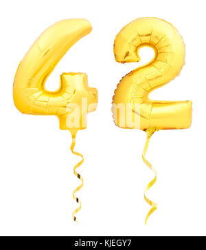 Golden number forty two 42 made of inflatable balloon with ribbon on white Stock Photo