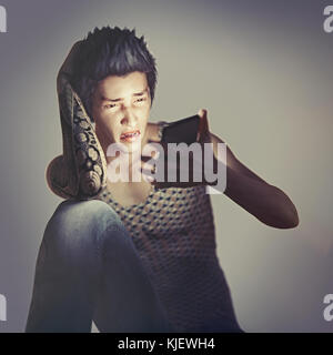 Frustrated mad texting on cell phone Stock Photo