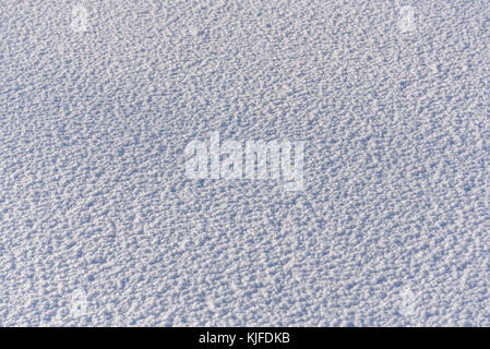 Winter abstract white background of snow surface with an interesting relief Stock Photo