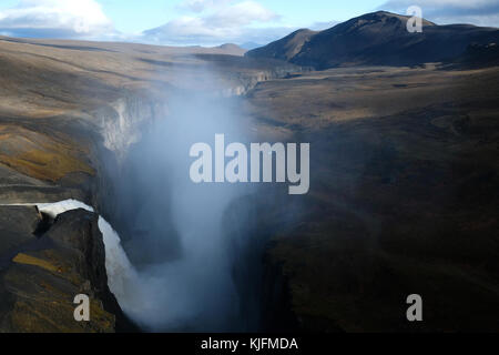 Waterfall flowing into Hafrahvammagljufur canyon from Karahnjukar Hydropower Plant (Kárahnjúkavirkjun), Fljótsdalshérað municipality, East Iceland Stock Photo