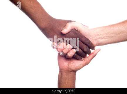 A close up view of a small group of men of mixed races holding hands in support Stock Photo