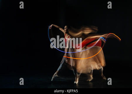 Nice cheerful woman enjoying the dance Stock Photo