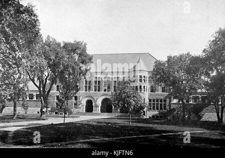 An exterior view of Austin Hall at Harvard University, the Romanesque Revival styled building was completed in 1884, it was the first building constructed for a law school in the country and was the first dedicated home of Harvard Law School, the building consists of two single story wings with a central two story section, Cambridge, Massachusetts, Boston, Massachusetts, 1913. Stock Photo