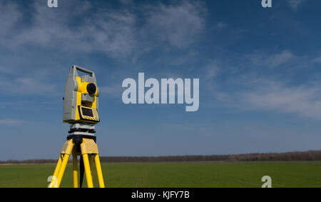 Surveyor equipment theodolite on tripod , panorama Stock Photo