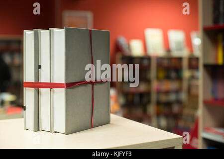 Books gift in a bookstore. Books on shelf on background Stock Photo