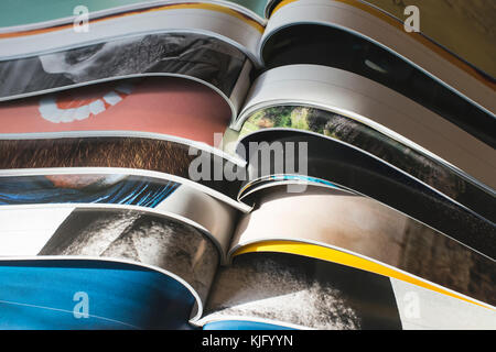 Many opened journals. Sun light. Stock Photo