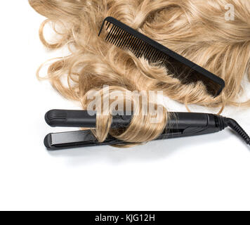 Curly blond hair with curling iron isolated on white Stock Photo