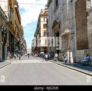 Rome, Lazio, Italy. May 22, 2017: View of the Roman shopping street called 'Via del Corso', on the right, main facade of the Catholic church 'San Giac Stock Photo