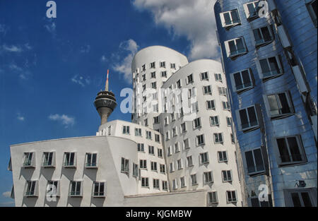 Dusseldorf, Germany - May 25, 2017: Gehry-Buildings (Gehry-Bauten) and Rhine Tower (Rheinturm) in Media harbor Stock Photo