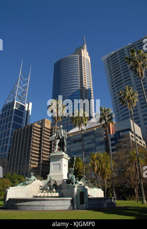 Sydney, Australia - July 7, 2017: Captain Arthur Phillip monument in Royal Botanical Gardens, Sydney, in front of Deutsche Bank Place building and Chi Stock Photo