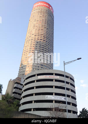 Johannesburg, South Africa - September 12, 2012: Ponte City Building at sunset. Ponte City is a famous skyscraper in the Hillbrow neighbourhood of Joh Stock Photo