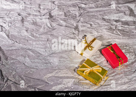 Boxes with gifts on a silver background Stock Photo