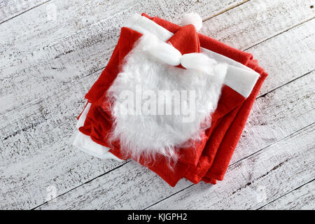 Santa Claus Costume on Wooden Background Stock Photo