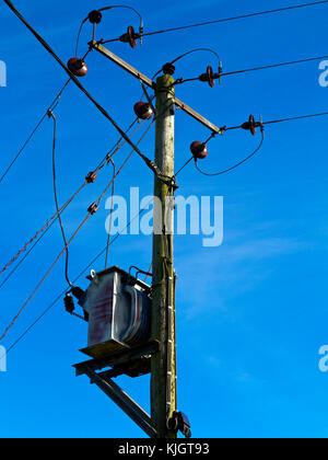 Wooden pole with electric cables Stock Photo - Alamy