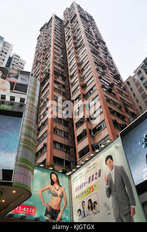 Hong Kong - May 21, 2008: Apartment skyscraper in Causeway Bay, Hong Kong. Stock Photo