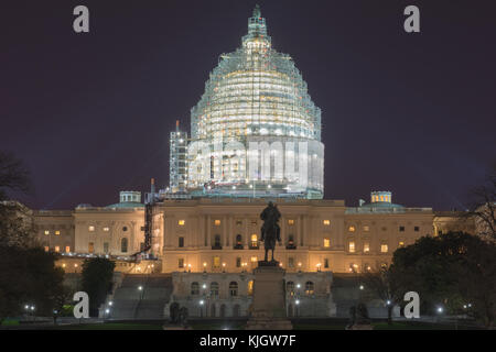 The Capitol Building of the United States of America at night. Seen with the dome under repair. Stock Photo