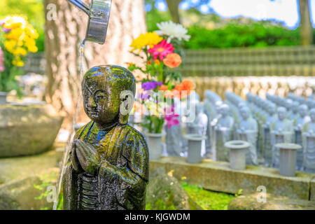Jizo Statue ritual Stock Photo