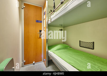 Train berth indoor with two beds. Travel background. Vertical Stock ...