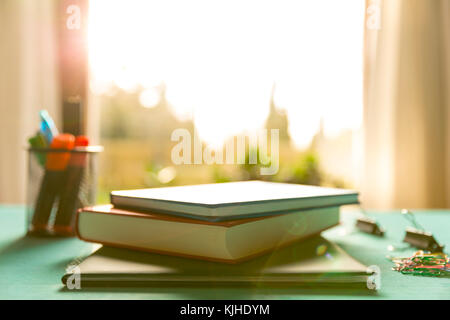 Back to school. Items for the school on a blue wooden table. Stock Photo