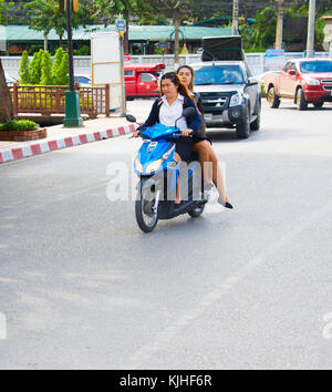 CHIANG MAI, THAILAND - JAN 12, 2017: Traffic on a road in Chiang Mai. Chiang Mai is the second largest city of Thailand Stock Photo