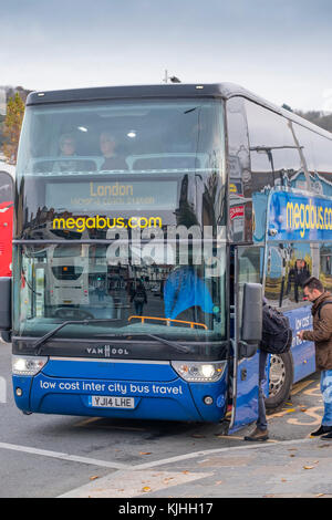 Megabus , UK low cost intercity coach travel bus  at Aberystwyth , departing for London Stock Photo