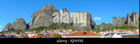 Panoramic view of The Meteora rocks and roofs of Kalambaka town in Greece - Landscape Stock Photo
