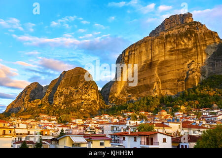 The Meteora rocks and roofs of Kalambaka town in the early morning, Greece - Landscape Stock Photo