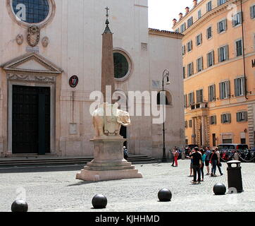 ROME ITALY - MAY 15, 2012. Tourists near Elephant and Obelisk by Bernini on square Piazza della Minerva in Rome city Stock Photo