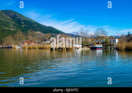 The pictursque waterfront of the island of kyra Frosini Nissaki at the lake Pamvotida, Ioannina, Greece. Stock Photo