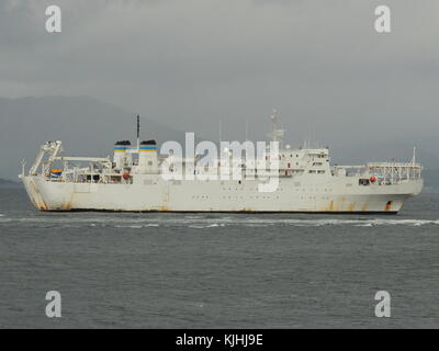 USNS Zeus (T-ARC-7), a Zeus-class cable laying and repair vessel operated by the US Navy, off Gourock on an inbound journey to the Faslane naval base. Stock Photo