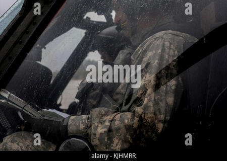 U.S. Army Chief Warrant Officers Michael Polyak front and Bryan