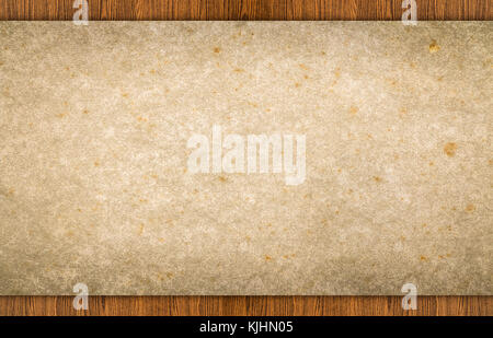 Old grunge blank paper put on wooden tabletop use for texts or products display Stock Photo