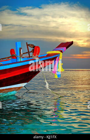 Colorful traditional fishing boat on the sea in Thailand Asia at sunset in Koh Tao, Koh Phangan, Koh Samui island seascape Stock Photo