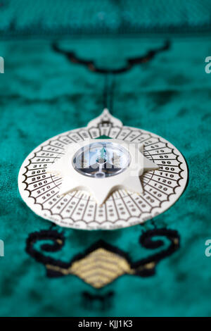 Qibla compass. Stock Photo