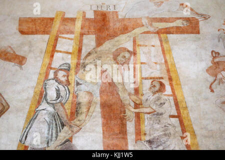 Vault de Lugny church.  16th century wall painting. Christ in his passion. Jesus is taken down from the cross.  France. Stock Photo