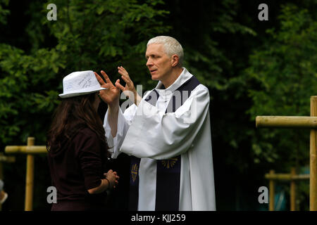 Confession at the FRAT catholic youth camp. France. Stock Photo