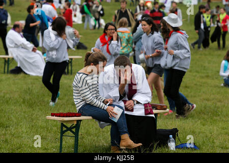 Confession at the FRAT catholic youth camp. France. Stock Photo