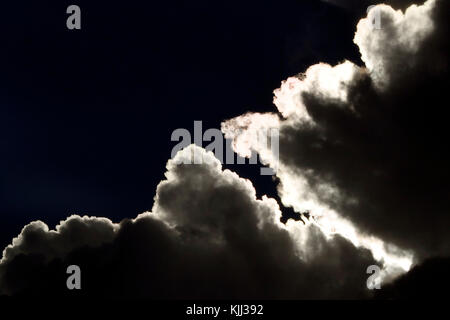Dramatic clouds in the sky during sunset.  Kenya. Stock Photo