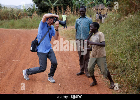 European photographer in Uganda. Uganda Stock Photo