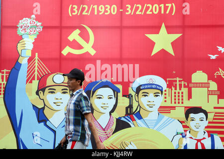 Communist government propaganda  poster in the street.  Ho Chi Minh City.  Vietnam. Stock Photo