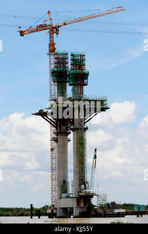 Bridge under construction across the Saigon River. Vietnam. Stock Photo