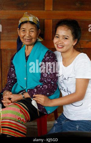 Bahnar (Ba Na) ethnic group. Two generations of women.  Kon Tum. Vietnam. Stock Photo