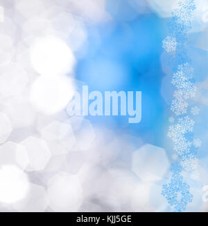 Decorative blue christmas background with bokeh lights and snowflakes Stock Photo