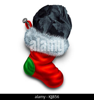 Chunk of coal in holiday stocking as a christmas symbol for naughty children gift or bad people seasonal winter present . Stock Photo