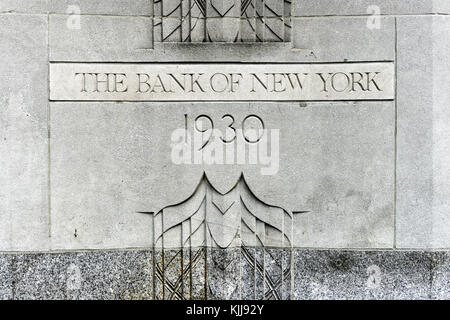 New York, USA - May 31, 2015: The Bank of New York Building cornerstone at 1 Wall Street, Manhattan. The Art Deco building is the current global headq Stock Photo